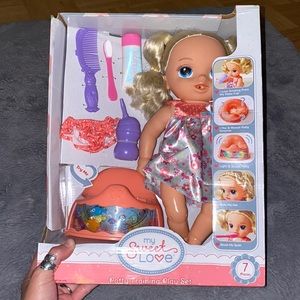 New in box doll works